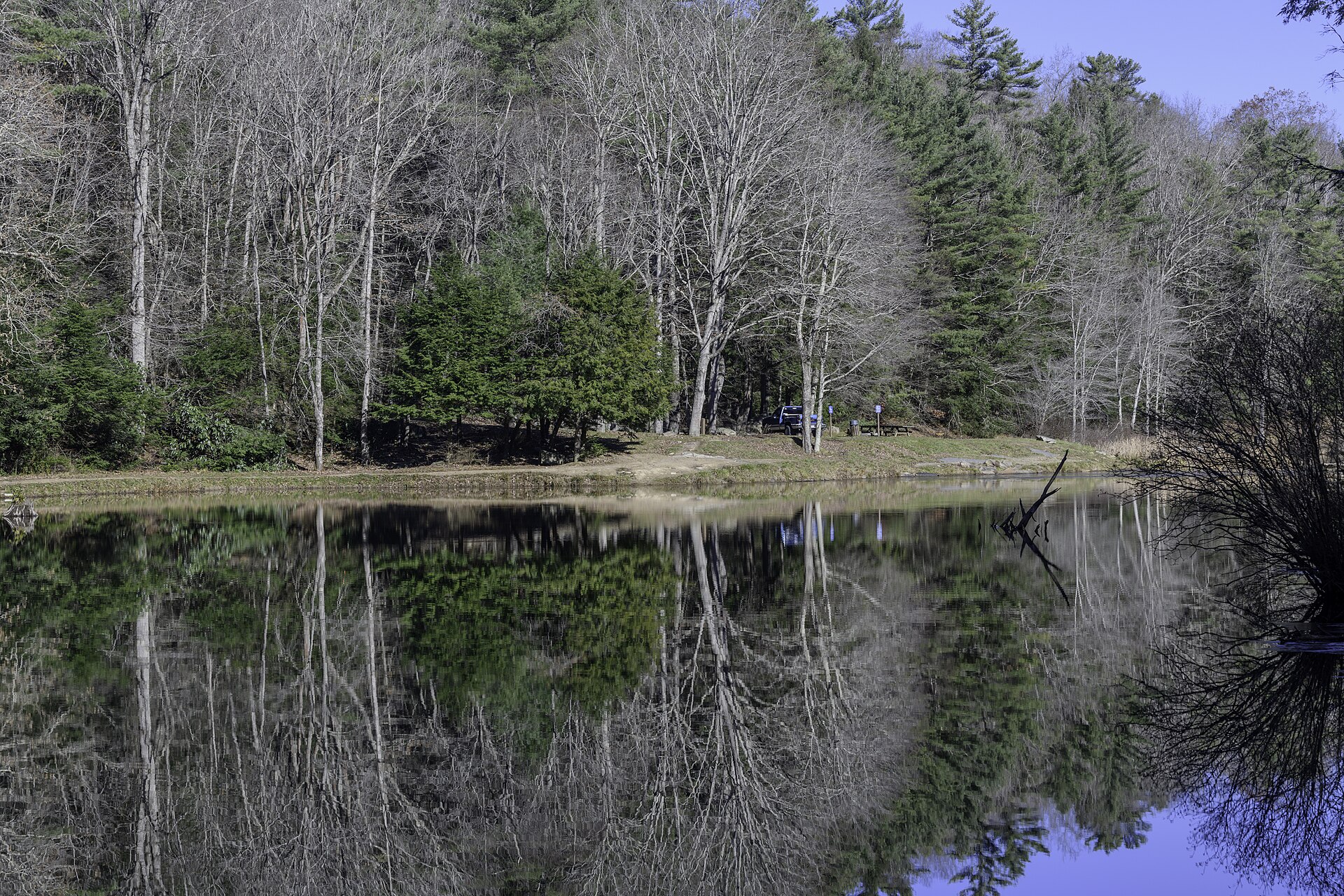 The lake and green Appalachian hills at Little Beaver State Park near Beckley, West Virginia